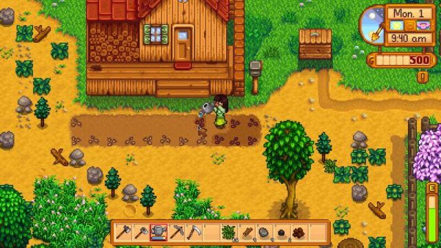 Stardew Valley in-game screen image #2 Watering seeds on player&#039;s farm on the first day.